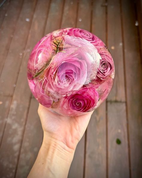 Dried roses crystal ball made by our artist @ soresinstudio #flowers #flowerpreservation #flowerpresent #floralpreservation #bouquetpreservation #weddingflowerpreservation #driedflowers #driedflower #driedflowersstyle #memories💕 #modernflowerpreservation #resinflowers #resinart #resinartwork #resinartist#wisedryflowerclass#epoxy Flower Drying, Resin Ball, Dried Roses, Drying Roses, Floral Preservation, Bouquet Preservation, Resin Artwork, Resin Flowers, Silica Gel