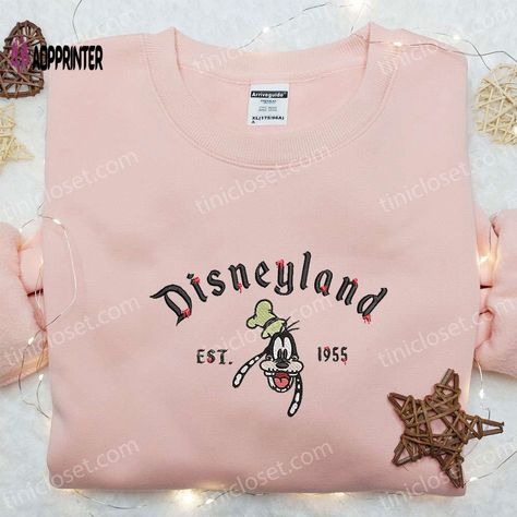 Introducing our Goofy Disneyland Est 1955 Embroidered Shirt, a timeless piece that celebrates the magic of Disneyland’s inception. Made with premium quality fabric, this shirt is adorned with intricate embroidery, showcasing Goofy in all his glory. With its vintage design and comfortable fit, it’s perfect for both Disneyland enthusiasts and fashion lovers. Wear it proudly to show your love for the happiest place on earth! Step into the spooky season with our Disney Halloween Embroide