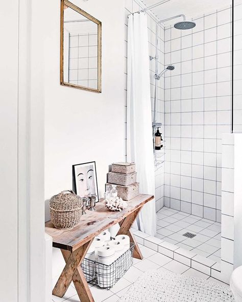 Simple accessories add personality to this small bathroom, with an old bench utilised as storage for wet room essentials. To see more of this Scandi-style home that mixes old with new, hit the link in our bio.  Styling - Luke Foged Photography - Morten Holtum/Living Inside Bathroom Storage Bench, Bathroom Bench, Old Benches, Square Tiles, Scandinavian Bathroom, Wet Room, Shower Bench, Hall Bathroom, Bench Decor