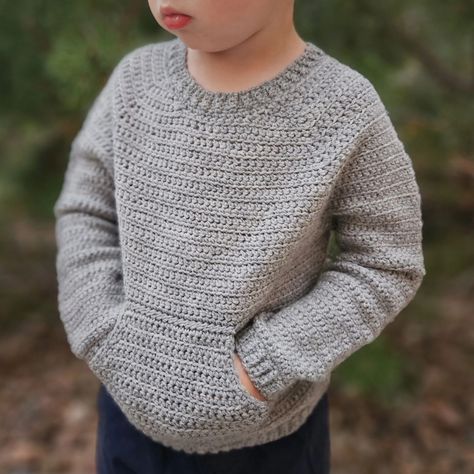 🌟New Pattern🌟 The Peekaboo Pocket Sweater is here! Made with @hobbii_yarn Highland Wool for the #hobbiitothemoonandback campaign (#sponsored) Crochet a cozy, stylish kids' sweater with this beginner-friendly pattern, perfect for everyday wear or sitting around a campfire. Featuring a classic raglan design, functional front pocket, and short rows for a comfortable fit, this pattern is a fun and functional make. #crochetforkids #crochetsweater #handmadekidsclothes #stitchandhoundcrochet Raglan Sweater Crochet, Handmade Kids Clothes, Single Crochet Decrease, Simple Stitch, Pocket Sweater, Raglan Sweater, Sweater Crochet, Baby Sweater, Sweater Crochet Pattern