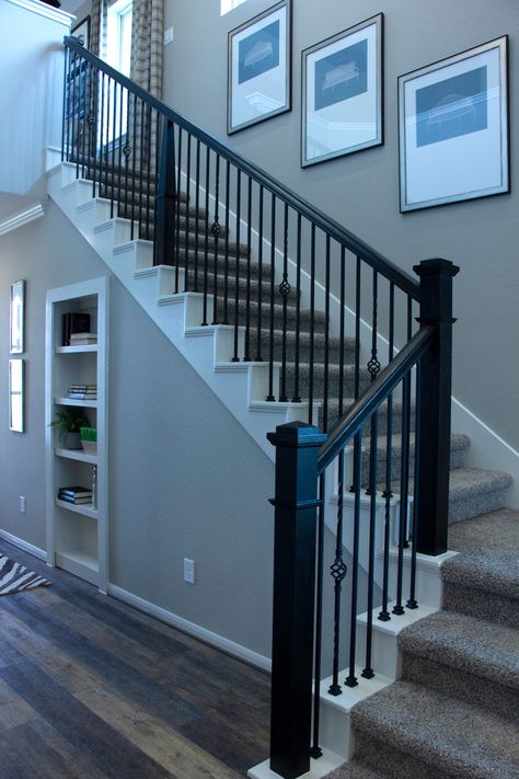 Black Newel Post Stairways, Black Stair Balusters, Farmhouse Entryway With Stairs, Modern Newel Post, Black Wood Stair Railing, Black Spindles Staircase, Stair Railing Black, Painted Stair Railings, Stairs Remodel