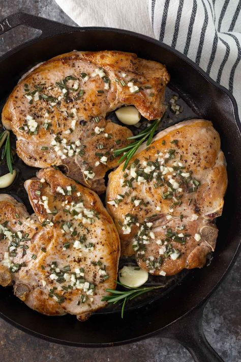 Tender and flavorful pork chops in a buttery garlic and rosemary sauce is an easy dinner ready in 30 minutes! Clean Eating Pork Chop Recipes, Clean Eating Pork Chops, Pork Chops In The Oven, Pork Loin Chops Recipes, Rosemary Sauce, Rosemary Pork Chops, Center Cut Pork Chops, Pork Entrees, Meat Meals