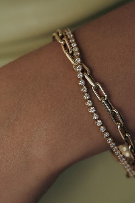 Popularized by famous tennis player Chris Evert in 1987 during the US Championships, the tennis bracelet is a timeless classic—then, now, always.Featuring 2mm round diamonds, four-prong cupcake set in 14k yellow or white gold. Wear alone or stacked with our Hampshire House Bracelet. Designed and created in Los Angeles with ethically and sustainably sourced diamonds. Price is determined by bracelet length due to diamond quantity.Features a box clasp with safety for secure closure. 14k solid gold— Tennis Bracelet Aesthetic, Bracelets Photography, House Bracelet, Hampshire House, Chris Evert, Cuban Bracelet, Link Chain Bracelet, Diamond Tennis Bracelet, Box Clasp