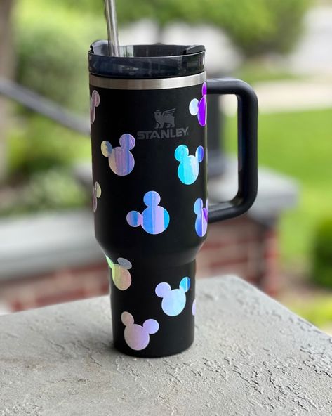 Calling all travel lovers! Decorate your 40 oz Stanley cup with these holographic mouse ears.  Stickers are waterproof, but please hand wash them (which is better for your cup as well!)  Pre-spaced stickers come with 2 extra mouse ears to help fill in any gaps or make small changes based on where you place the transfer paper. Stanley logo can be avoided when you carefully place the transfer paper to where the ears are to the left, right, and bottom. Stanley Logo, Copo Starbucks, Stanley Products, Fancy Cup, Trendy Water Bottles, Disney Cups, Disney Mickey Ears, Cute Coffee Cups, Holographic Stickers