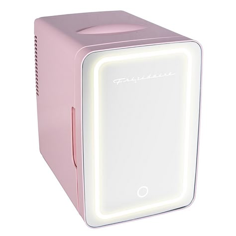 Frigidaire .35 Cu.-Ft. 15-Can Mini Portable Personal Fridge - Pink The Pink Frigidaire Portable Personal Fridge keeps your food and drinks the ideal temperature while at home and on the go. The ultimate versatile cooler, this mini fridge has a compact, space-saving design and lightweight features that make it easy to take with you anywhere while the lighted mirror door serves as a handy place to apply makeup. A removable shelf makes it easy to store milk, juice, yogurt, bottles, smoothies, chees Mini Food Fridge, Mini Fridge For Food, Skincare Fridge, Pink Beauty Fridge, Mini Fridge With Skincare, Mini Skincare Fridge, Mini Fridge Pink, Cheap Mini Fridge, Mini Fridge In Bedroom Aesthetic