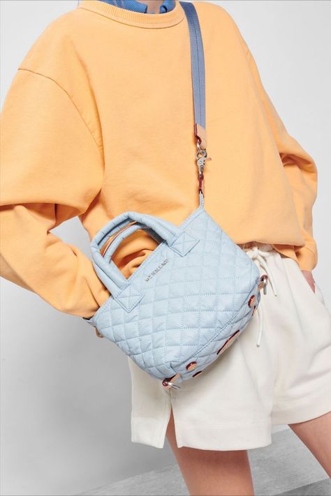 Show off your softer side with a light blue mini crossbody bag, just in time for spring. Light Blue Handbag Outfit, Baby Blue Bag Outfit, Light Blue Purse Outfit, Light Blue Bag Outfit, Blue Handbag Outfit, Blue Purse Outfit, Blue Bag Outfit, Purse Outfit, 2025 Spring