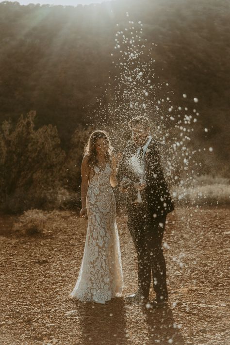 Wedding Champagne Spray Photo, Champagne Wedding Photography, Champagne Popping Pictures Wedding, Elopement Champagne Pop, Wedding Champagne Photo, Wedding Champagne Spray, Champagne Spray Engagement Photo, Champagne Pop Wedding Photo, Champagne Pop Wedding