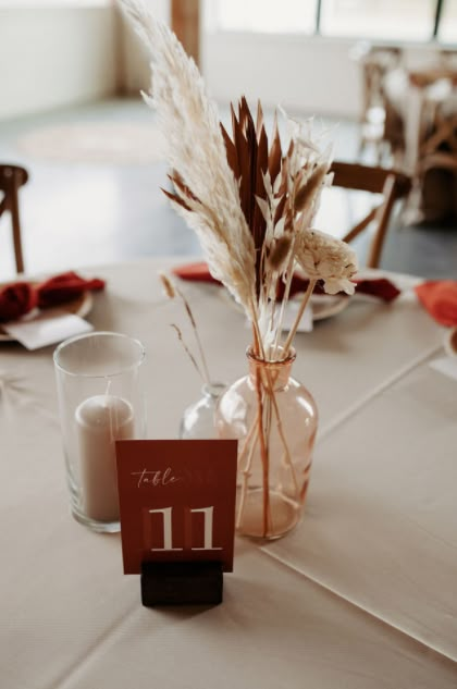 Ivory And Terracotta Wedding Table, Table Centerpieces Boho Wedding, Terracotta Table Centerpiece Wedding, Terracotta And Rust Wedding Decor, Terracotta Pampas Centerpiece, Boho Wedding Table Centrepiece, Fall Wedding Centerpieces Pampas, Boho Table Centrepiece, Terracotta Wedding Reception Decor