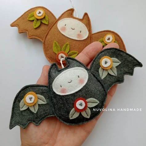 Summer is for designing new Halloween (and Christmas🎄🎅🏼) ornaments 🦇🎃 I'm not a fan of spooky things though, I much prefer cuteness (who would ever have guessed).The pattern is already in the shop, link in bio.🦇 . . #halloween #autumn #feltbat #notsospooky #handmade #sewingpattern #pdfpattern #halloweenornaments #cutehalloween Felt Halloween Decorations, Fall Felt Crafts, Felt Halloween Ornaments, Felt Bat, Halloween Felt Crafts, Halloween Crafts To Sell, Felt Decor, Mascaras Halloween, Felt Ornaments Patterns