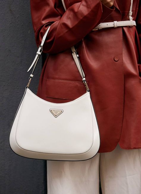 10 Street Style Trends That Are All Over Copenhagen in 2021 | Who What Wear UK White Prada Cleo, Prada Cleo Bag, Cleo Bag, Prada Cleo, Copenhagen Fashion Week Street Style, Purse Outfit, Bag Prada, Copenhagen Fashion, Stylish Purse