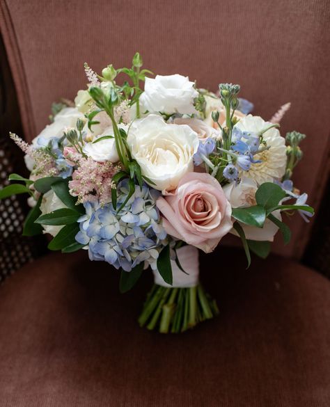 Pretty pastel blue and pink bridal bouquet with hydrangea, roses, delphinium and astilbe. 💕⁠
⁠
Photography: @welcomematz_⁠
Catering: @jamcatering⁠
Venue: @tylerarboretumweddings⁠ Hydrangea Rose Bouquet, Pink Peonies And Blue Hydrangeas, Purple Hydrangea Bouquet, Blue Hydrangea And Pink Rose Bouquet, Blue Hydrangea Pink Peony Bouquet, Blue Hydrangea Yellow Rose Bouquet, Marigold Wedding, Bridal Bouquet Pink, Hydrangea Bouquet