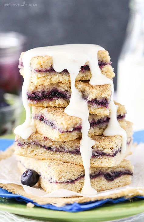 These Blueberry Jam Cake Bars are quite literally a bar version of cake. They're soft, moist, and the blueberry jam layer in the middle makes them a delicious breakfast or dessert option! #blueberry #blueberryjam #cakebars #blueberrybars #blueberryrecipe #breakfastbars #dessertbars Cake Bars Easy, Blueberry Jam Cake, Weeknight Desserts, Life Love And Sugar, Cake Bars Recipe, Jam Cake, Easy Bar Recipes, Streusel Coffee Cake, Linzer Cookies