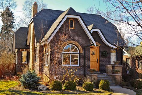 french tudor homes | Craftsman. Two-toned brick with an enclosed porch, this home has .. Small Tudor Style Homes, 1920s Craftsman Bungalows, Denver Homes, Tudor Houses, Tudor Homes, Brick Cottage, Tudor Cottage, 1920s House, Cottages And Bungalows