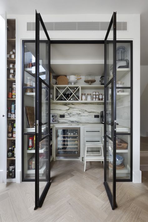 To mirror the Crittall extension, we also installed Crittall for the pantry. Crittall offers multiple glazing options, such as ribbed or frosted glass, to ensure privacy. #pantry #modernpantry #kitchenideas #interiordesign #moderkitchen #crittall #crittalldoors #crittallpantry #pantrydoors #pantryinspiration #pantryidea Crittall Extension, Crittal Door, Crittall Windows, Crittal Doors, Modern Pantry, Pantry Inspiration, Crittal Windows, Open Plan Kitchen Dining Living, Open Plan Kitchen Dining