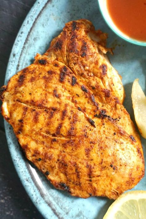 Nando's Peri Peri Butterfly Chicken Breast Recipe, one of the most delicious chicken recipes. Why not make it at home, it's super easy to make, and it tastes just like the real deal. Serve it with fries and corn on the cob for a full Nando's experience. The peri peri marinade is what gives the chicken a unique flavour, and makes it a fantastic chicken recipe every single time. The homemade peri peri chicken tastes just like the restaurant one.#periperichicken, #chickenrecipe, #periperimarinade Nandos Butterfly Chicken, Butterfly Chicken Recipes, Nandos Chicken Recipe, Peri Peri Marinade, Nando's Chicken, Butterfly Chicken, Butterfly Chicken Breast, Delicious Chicken Recipes, Peri Chicken