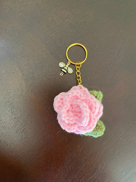 Crochet heart keychain patterns are perfect for weddings, anniversaries, or any other special occasion. They're easy to make and personalize, and they're sure to be a cherished keepsake for your loved.#crochetkeychain #handmadegifts #DIYkeychain #crochetlove #keychainaddict Crochet Rose Keychain, Crocheted Keychains, Crochet Charms, Rose Keychain, Coquette Crochet, Crochet Hand Warmers, Keychain Patterns, Crochet Keychains, Keychain Pattern