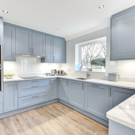 A classic blue finish has been chosen for this project, to combine nicely with sparkling white work surfaces, which are illuminated by undercabinet downlights. 

Horsham Showroom: 01403 721086 I Worthing Showroom: 01903 522555 I Website: https://alexanderkitchens.co.uk/. Conservatory Style Kitchens, Hamptons Blue Kitchen, Egg Shell Blue Kitchen, Light Blue Shaker Kitchen, Light Blue Small Kitchen, Baby Blue Kitchen Ideas, Light Blue Modern Kitchen, Blue Kitchen Design Ideas, Pale Blue Kitchen Ideas