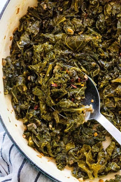 Braised kale is a simple way to tenderize and deepen the flavor. The greens first saute to maximize the aromatics in the dish then get covered and simmer. #kale #braisedkale #healthyrecipes #sidedish Soul Food Kale Greens, Stewed Kale Recipes, Hot Kale Recipes, Kale Southern Style, Braised Greens Recipes, Kale Greens Recipe Southern Vegan, Southern Kale Greens, Southern Kale Recipes, Boiled Kale Recipes