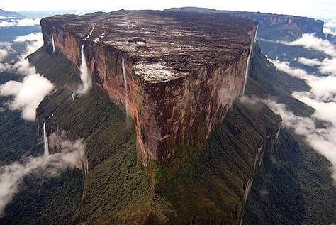 Mount Roraima (mountain, South America) giant flat-topped mountain, or mesa, in the Pakaraima Mountains of the Guiana Highlands , at the poi... Mysterious Places On Earth, Monte Roraima, Mount Roraima, Baffin Island, Socotra, Mysterious Places, Angkor, Latin American, Tunisia