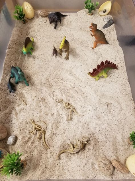 Dino Dig Sensory Bin, Dollar Store Sensory Bins, Dinosaur Playdough, Infant Activity, Dinosaur Activity, Childcare Ideas, Dinosaur Skeletons, Dinosaur Dig, Dinosaurs Preschool