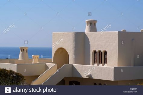 Download this stock image: MODERN NEO MOORISH ARCHITECTURE ON THE ALGARVE IN PORTUGAL. EUROPE - BA20RT from Alamy's library of millions of high resolution stock photos, illustrations and vectors. Neo Moorish, Building Forms, Barcelona Restaurants, Moorish Architecture, Ancient Buildings, Algarve, Seville, Architecture Building, Barcelona