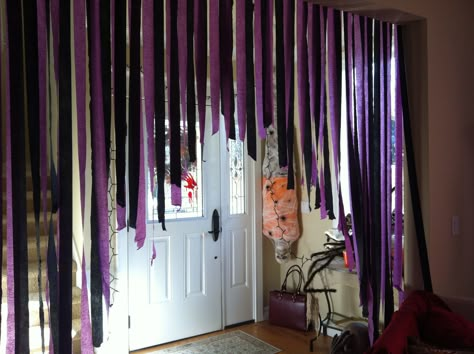 Streamers used to close off a room Streamers Doorway, Streamers On Ceiling Ideas, Halloween Streamers Ideas, Halloween Party Streamer Ideas, Black Streamers Halloween, Halloween Decorations Streamers, Streamers Decorations Ideas, Streamer Halloween Decorations, Ways To Hang Streamers