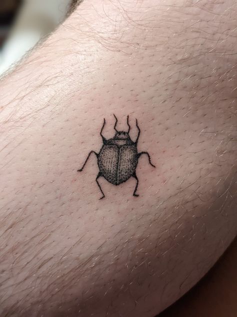 Stick and poke bug tattoo Stick And Poke Nature, House Stick And Poke, Bug Stick N Poke, Leg Tattoos Stick And Poke, Tiny Beetle Tattoo, Cute Beetle Tattoo, Beetle Stick And Poke, Simple Beetle Tattoo, Beetle Tattoo Small