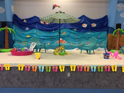 Beach School Decorations, Diy Beach Backdrop, Beach Backdrop Ideas, Beach Theme Decorating Ideas, Vbs Beach Theme, Beach Theme Stage Design, Beach Theme Vbs Decorating Ideas, Beach Set Design Theatre, Vbs Beach Theme Decorations