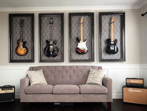 Guitar room. Handmade frames. Custom upholstery. Decorate With Guitars, Guitar Room Ideas Man Caves, Guitar Room Design, Home Office Guitar Room, Guitar Frame Display, Guitar Mounted On Wall Decor, Guitar Collection Display, Guitars On Wall Living Room, Guitar Bedroom Ideas