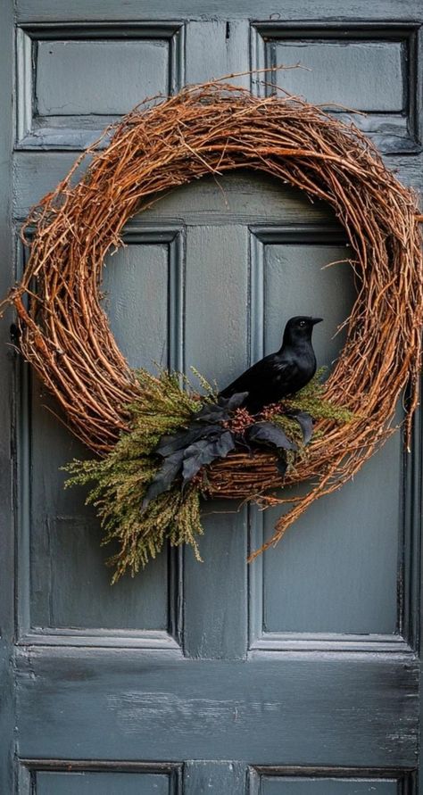 Elevate your Halloween decor with these enchanting wreath ideas. Transform a grapevine base into a witch's lair by adding broomsticks, potion bottles, and faux moss. Weave in purple and orange ribbon for a pop of color. These Halloween wreath ideas blend whimsy and wickedness, creating a focal point that sets the tone for your spooky celebrations. Customize with battery-operated candles for an eerie flickering effect that will bewitch all who approach your door. Witch Lair Halloween Decor, Fall Grapevine Wreath Ideas, Witch Door Decoration, Witchy Wreaths, Witches Door, Halloween Wreath Ideas, Witch Door, Halloween Arts, Spooky Wreath