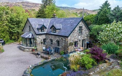 Ring of Kerry stone cottage is the ultimate Irish dream home | IrishCentral.com Houses In Ireland, Moving To Ireland, Stone Cottages, Irish Cottage, Ireland Homes, Stone Cottage, Country Bedroom, Stone Houses, Lush Garden