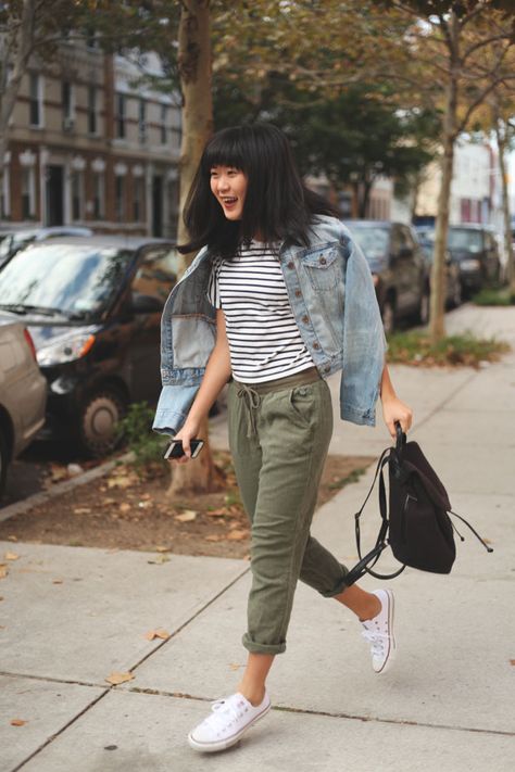 Instagram: @jennifhsieh || Denim Jacket, Striped Crop Top, Olive Green Pants, White Converse Sneakers, Black Mini-Backpack || #Fall #Fashion #Outfit Green Pants Striped Shirt Outfit, How To Style Green Joggers For Women, Olive Green Cropped Pants Outfit, Green Capris Outfit, Olive Chinos Outfit Women, Stripes Top Outfit, Green Pants White Top, Olive Jogger Outfits Women, How To Style Olive Green Pants