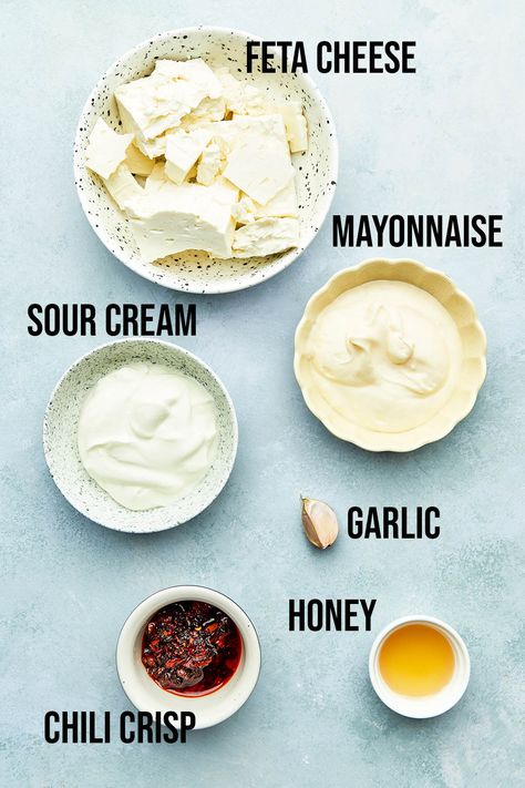 Whipped feta with honey is a quick 10-minute dip or spread. Creamy and salty-sweet, it's topped with spicy chili crisp for extra flavor. Strawberry Cobbler, Feta Dip, Whipped Feta, Fig Jam, Spicy Chili, Honey Garlic, Honey Recipes, Dried Tomatoes, Roasted Red Peppers