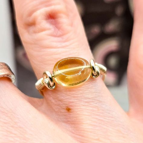 🚨 WARNING! Contents of this post are one-of-a-kind - and just a bit juicy!! 😝 We've paired one of these handmade rings with recycled sterling silver wire, golden yellow Citrine gemstone, and a pretty peach freshwater pearl. 💎 Citrine is known for luck wealth and prosperity, while pearls are often associated with beauty, purity, the Moon and femininity. ✨ Citrine size J Pearl size M ⭐ Don't miss out! Only one of each! Available now via my @folksyhq ~ 🌍 As always, we send our orders tra... Wealth And Prosperity, November Birthday, Citrine Jewelry, Sterling Silver Stacking Rings, Precious Gemstones Jewelry, Celestial Jewelry, Yellow Citrine, Citrine Gemstone, Handmade Rings