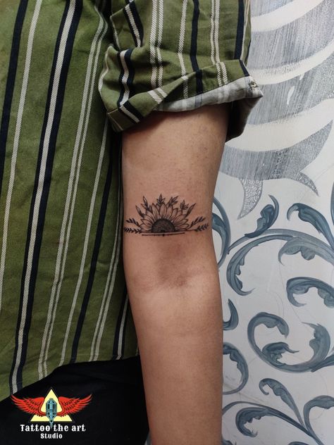 Half Flower Wrist Tattoo, Sun Flower Cover Up Tattoo, Half Sun Flower Tattoo, Sunset And Flower Tattoo, Sun Tattoo Elbow Crease, Sun Tattoo On Forearm, Half A Sunflower Tattoo, Sunflower Sunset Tattoo, Hand Sun Tattoo