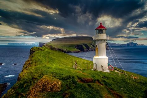 12 things to do in the Faroe Islands | Atlas & Boots Turf Roof, Northern Island, Rock Climbers, Faroe Islands, Boat Tours, Places In The World, Rock Climbing, Hiking Trails, Old Town