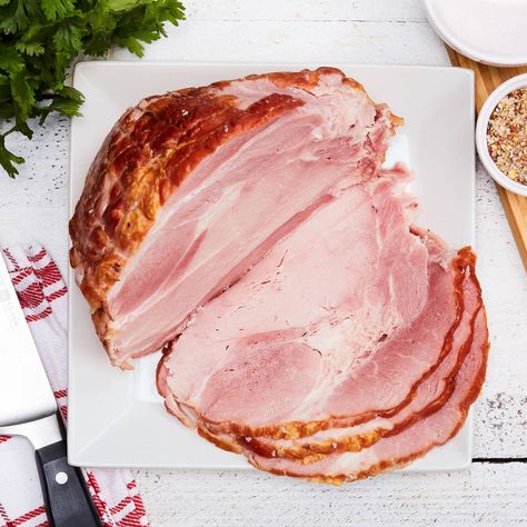 Whether you like it in the slow cooker, or sliced on a sandwich, this naturally smoked black forest ham straight from Simcoe will not disappoint! A lean cut of tender, flavourful pork; this is the perfect addition to any lunch or dinner – especially for the holidays! This ham is antibiotic-free like other pork, and is raised without added hormones. This delicious, classic cut is so versatile it really is a no-brainer. Smoked Boneless Ham, Ham Photography, Boneless Ham, Meat Photography, Ham Slices, Black Forest Ham, Meat Delivery, Smoked Ham, 2024 Design