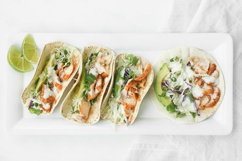 Easy Fish Tacos with Lime Crema: When lime and cilantro come together with fish, a mouthful of exquisite flavour is born. Try these easy fish tacos with lime crema and see for yourself! | aheadofthyme.com Fish Tacos With Lime Crema, Easy Mexican Dishes, Fish Tacos With Cabbage, Chef Ramsey, Dinner Spring, Easy Fish Tacos, Lime Crema, Ibs Recipes, Recipe List