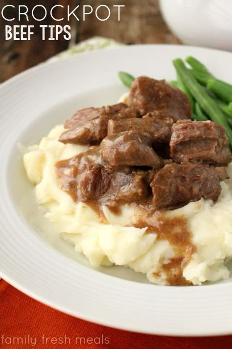 Easy Crockpot Beef Tips and Gravy - FamilyFreshMeals.com - My family loves this one! Beef Tips In Crock Pot, Crockpot Beef Tips And Gravy, Crockpot Recipes Beef Tips, Crockpot Beef Tips, Beef Crockpot, Beef Food Recipes, Beef Tips And Gravy, Family Fresh Meals, With Mashed Potatoes