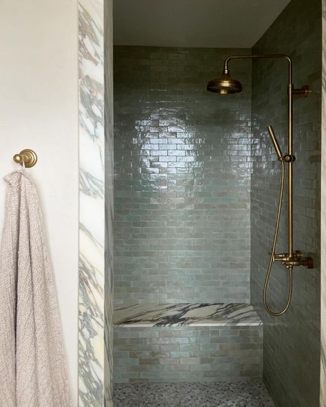 Watermark Designs | In a bathroom this grand, treating yourself to two faucets is simply the sensible thing to do, right? 🤷🏽‍♀️ Design:… | Instagram Iridescent Tile Bathroom, Zellige Tile Bathroom, Tiles Of Ezra, Iridescent Tile, Subway Tile Showers, Online Design Services, Pony Wall, Bathroom Transformation, Watermark Design