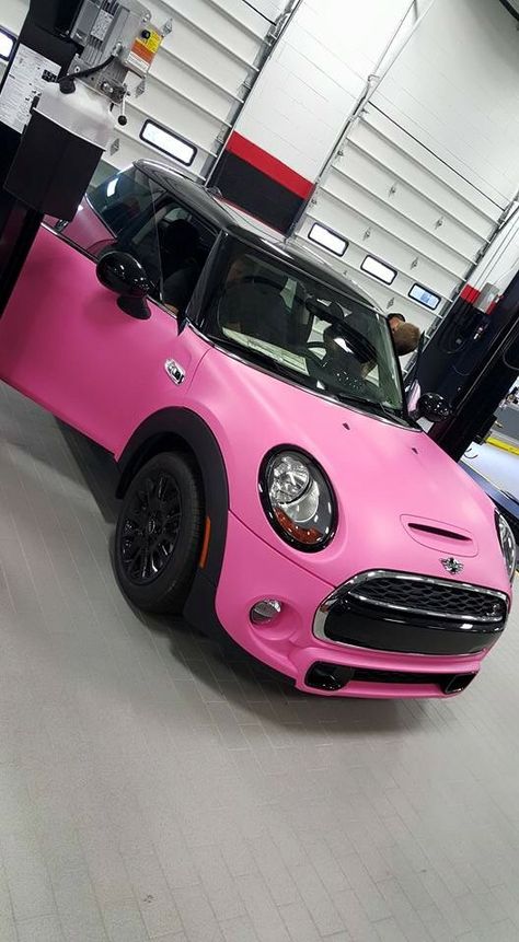 A pink wrapped Mini Cooper Wrapped Mini Cooper, Cheap Cars For Teens, Pink Mini Cooper, Pink Mini Coopers, Mini Cooper Accessories, Dog Car Accessories, Car For Teens, Mini Copper, Mini Coopers