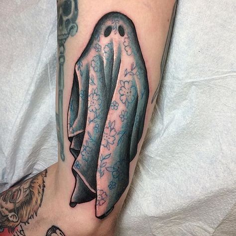 #CoolTattoos #TattooArt #InkMaster #TattooDesigns #InkedUp #TattooLovers #InkInspiration #TattooIdeas #CreativeInk #TattooStyle Sheet Ghost Tattoo, Wrist Tattoo Designs, Wrist Tattoo Ideas, Ghost Tattoo, Sheet Ghost, Upper Arm Tattoos, Spooky Tattoos, Ink Master, Wrist Tattoo