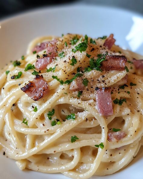 "Everyone in my family can’t get enough of this Spaghetti Carbonara! It’s creamy, dreamy, and the perfect comfort food. 🤍   Ingredients: - Spaghetti - Eggs - Parmesan cheese  For the rest of the ingredients and full instructions, check the link in the first comment [👇] [👇].  #SpaghettiCarbonara #PastaLovers #ComfortFood #Yummy #CookingAtHome" Spaghetti Carbonara Creamy, Spaghetti Carbonara Aesthetic, Carbonara Aesthetic, Spaghetti Parmesan, Spagetti Carbonara, Everyone In My Family, Creamy Spaghetti, Pasta Carbonara, Carbonara Pasta