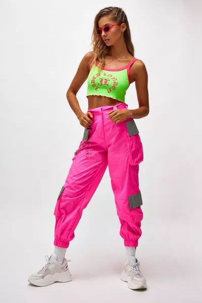 80s Neon Outfit, Cargo Pants Outfit Fall, Neon Pink Pants, White Cargo Pants Outfit, Pink Rave Outfit, Neon Party Outfits, Green Cargo Pants Outfit, Neon Pants, Bright Colors Fashion