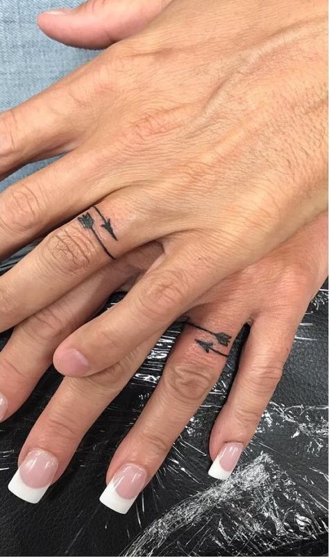 Lil Arrow Wedding Bands #ringfingertattoo #fingertattoo Tattoo On Ring Finger, Ring Finger Meaning, Ring Finger Tattoo, Finger Meaning, Infinity Couple Tattoos, Finger Tattoos For Couples, Ring Tattoo Designs, Wedding Band Tattoo, Tattoo Wedding