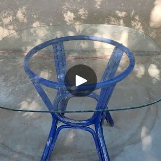 DIY outdoor table makeovers | DIY outdoor table idea (wait until you see the end result!) | By DIY with Hometalk | Got this old glass table. Get
it all cleaned up. I'm going to tape around all of the edges.
Next, we're going to do that two-part epoxy. We're going to
pour it halfway down the table. Next, we're going to mix a
little bit of teal. We're going to pour it out. We're
going to go with the darker green and you're going to start
spreading out that white. Start getting rid of all that flaky
paint. Start spraying it with some good spray paint. It was
time to put on the darkest color we have. Put some more
waves on and spread it all out. What a wonderful addition to
the back porch. I measured and marked the table in half eight
even spaces. I piped the mask stick into each bottle top an Painted Glass Table Top, Best Spray Paint, Diy Outdoor Table, Bottle Top, Table Makeover, Resin Table, Back Porch, Glass Top Table, Outdoor Tables