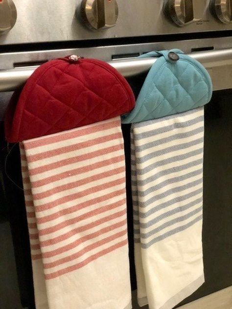 The dish towels in my kitchen are always falling on the floor. It’s so annoying! I tried a simple and inexpensive hack to keep my kitchen towels hanging and off the floor. This hack is not only useful, it’s pretty, too! I only needed some simple dish towels and pot holders (with their own loops) for my project. I started out by folding the dish towel in thirds so it was about the same width as the pot holder. I then folded both the dish towel and pot holder in half (from top to bot… Fold Kitchen Towels, Turned Candlesticks, Small Kitchen Hacks, Kitchen Towels Hanging, Tea Towels Diy, Hanging Kitchen Towel, Pottery Barn Inspired, Craft Stash, Tea Bag Holder