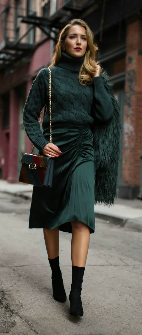 Cable-knit emerald green sweater, ruched satin emerald green midi skirt, faux fur jacket, black sock boots, multi jewel-toned handbag {Theory, MM6 Maison Margiela, Anthropologie, Tory Burch, Stuart Weitzman, classic style, classy dressing, fall trends, fashion blogger, wear to work} Classy Dressing, Emerald Green Sweater, Black Sock Boots, Trendy Winter Fashion, Green Midi Skirt, Work Sweaters, Fur Accessories, Sock Boots, Retro Mode