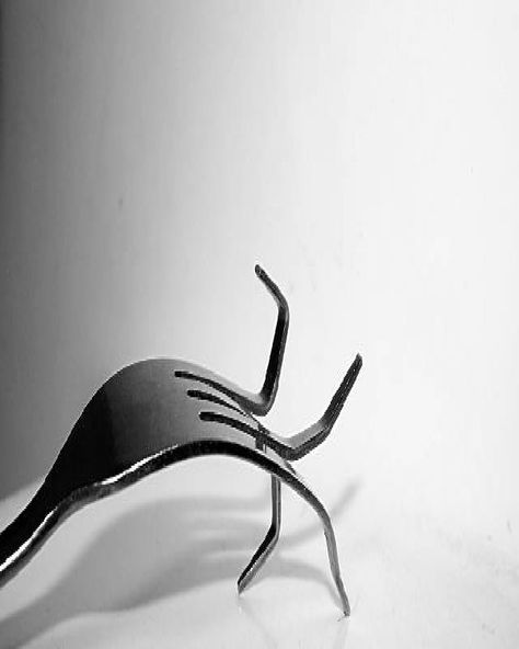 Fork bending Weird Hobbies, Do Something, Forks, Bending, The Mind, The Public, Spoons, Rectangle Glass, Bend