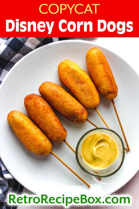 Copycat Disney Corn Dogs recipe, you can experience some of the happiest place in the comfort of your own home! Copycat Disneyland corn dogs are tasty treats similar to the Disneyland classic. Whether you are reminiscing about your last Disney adventure or just want the best corn dogs for dinner, this delicious recipe is a winner! retrorecipebox.com dinner ideas, hot dogs recipes Corn Dogs Recipe, Dogs Recipes, Corndog Recipe, Hot Dogs Recipes, Adventures By Disney, Corn Dogs, Tasty Treats, Copycat Recipes, Yummy Treats